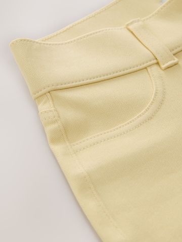 Next Дънки Bootcut Клин в жълто