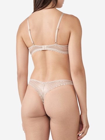 String di ETAM in beige