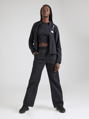 NIKE Funktionstopp 'One' i svart