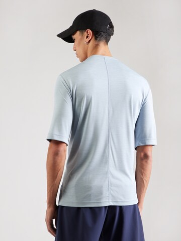 Reebok - Camiseta funcional en azul