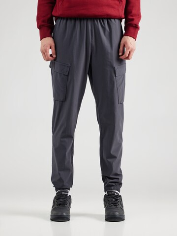 pilka Nike Sportswear Siaurėjantis Laisvo stiliaus kelnės 'CLUB': priekis