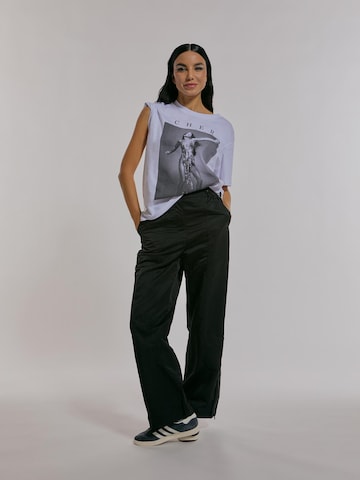 ABOUT YOU x Chiara Biasi Loose fit Pants 'Cleo' in Black