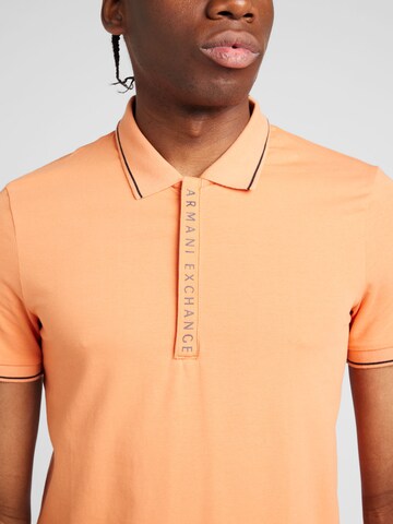 ARMANI EXCHANGE Poloshirt in Orange