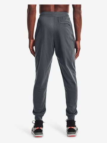 UNDER ARMOUR Tapered Sporthose in Grau