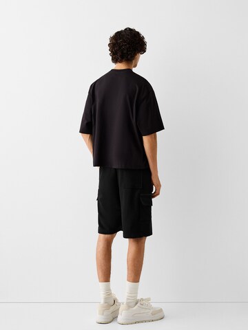 Bershka Loosefit Shorts in Schwarz