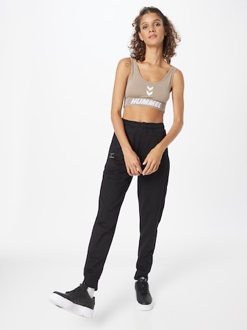 Effilé Pantalon de sport 'OFFGRID' Hummel en noir