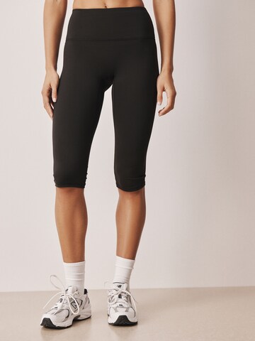 Next Skinny Funktionshose in Schwarz: Vorderseite