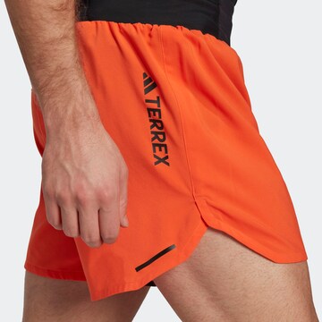 ADIDAS TERREX Regular Workout Pants in Orange