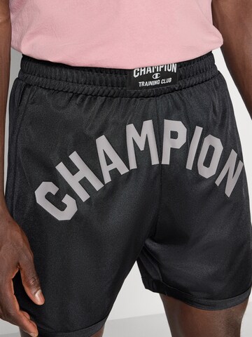 Champion Authentic Athletic Apparel Normalny krój Spodnie sportowe w kolorze czarny