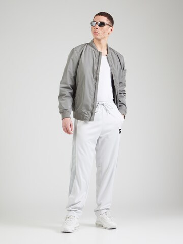 Nike Sportswear Normální Kalhoty 'AIR' – šedá