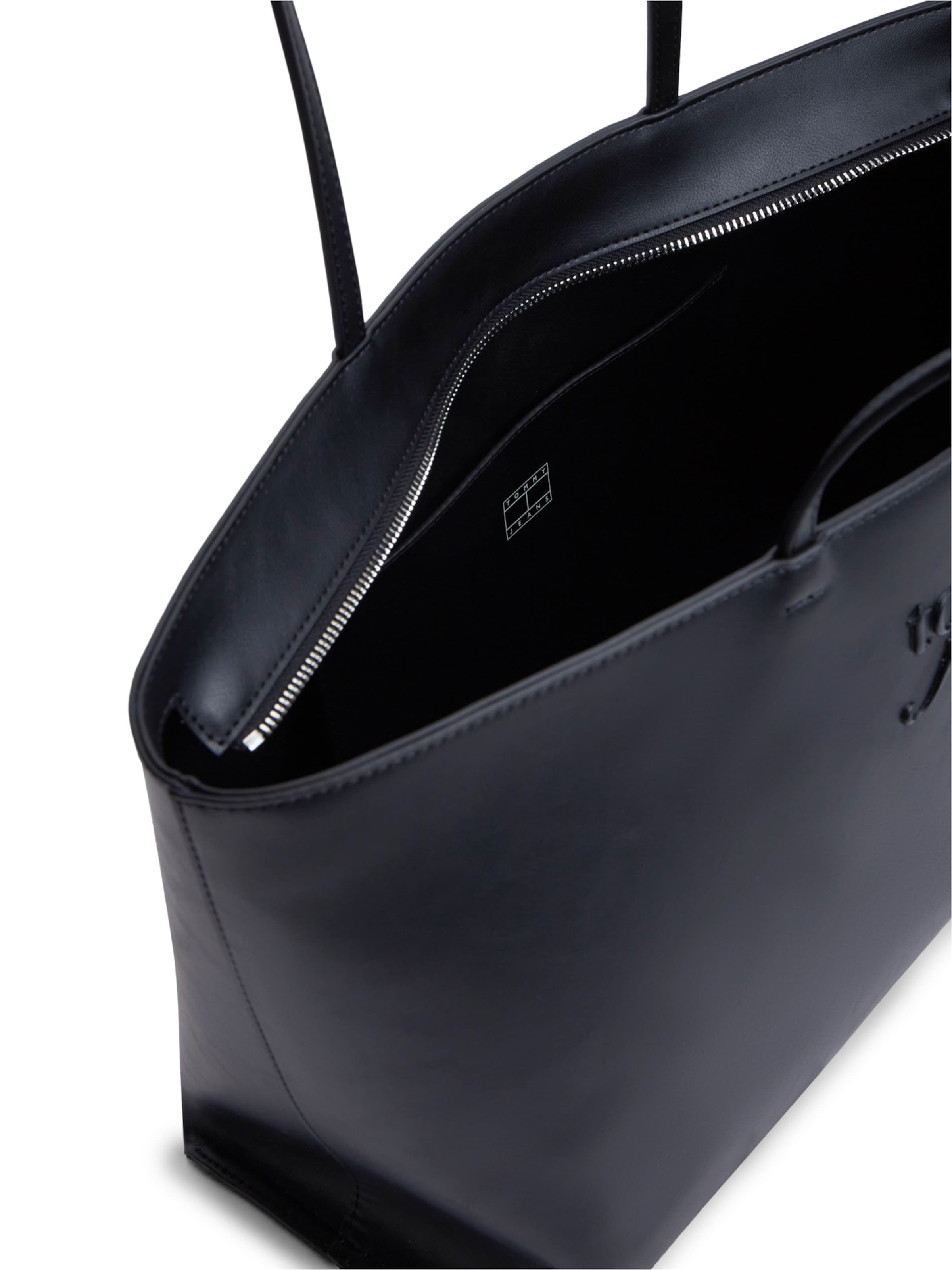 Tommy Jeans Ostoskassi 'MUST' värissä musta