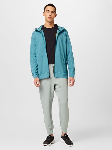 NIKETapered Sportske hlače - zelena boja