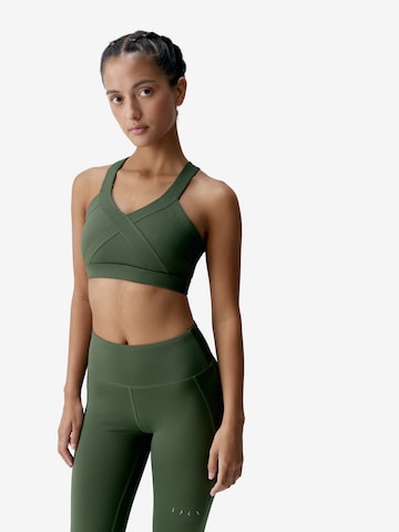 Born Living Yoga Sporttop ' Umay ' in Groen: voorkant