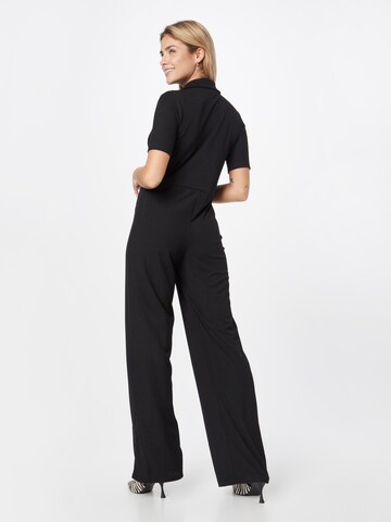 Tuta jumpsuit di Warehouse in nero