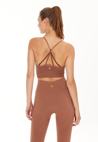 Athlecia Regular Sports bra 'FOAN' in Brown