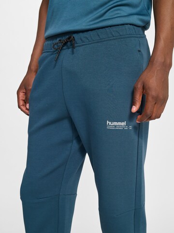 Hummel Tapered Sportbroek 'Tech Fleece' in Blauw