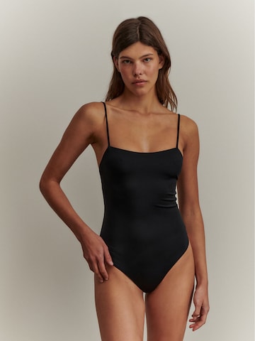 ABOUT YOU x Marie von Behrens Bralette Swimsuit 'Vanessa' in Black: front