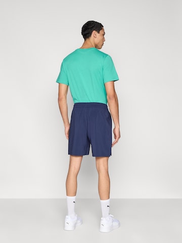 PUMA regular Παντελόνι φόρμας 'TAD ESSENTIALS' σε μπλε