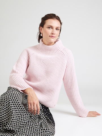 rozā monari Džemperis: no priekšpuses