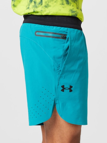 Regular Pantalon de sport 'Peak' UNDER ARMOUR en bleu
