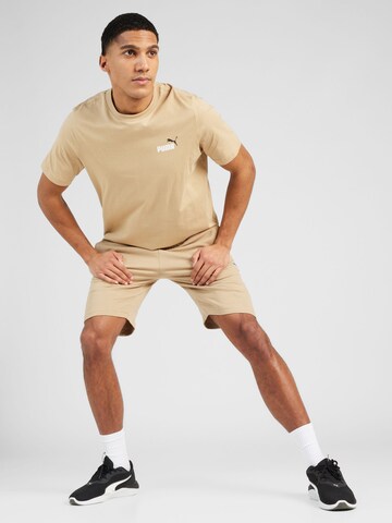 PUMA Regular Shorts 'BETTER ESSENTIALS  9' in Braun