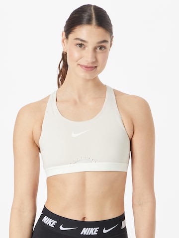 Bustier Soutien-gorge de sport NIKE en beige : devant