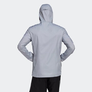 Giacca sportiva 'Own The Run' di ADIDAS SPORTSWEAR in grigio