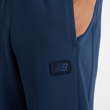 new balance - Regular Calças de desporto 'Post Season' em azul