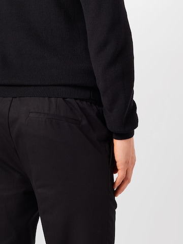 BURTON MENSWEAR LONDON Regular Trousers with creases in Black