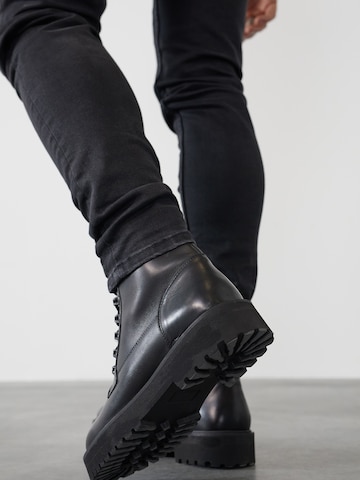 DAN FOX APPAREL Lace-Up Boots 'Alen' in Black