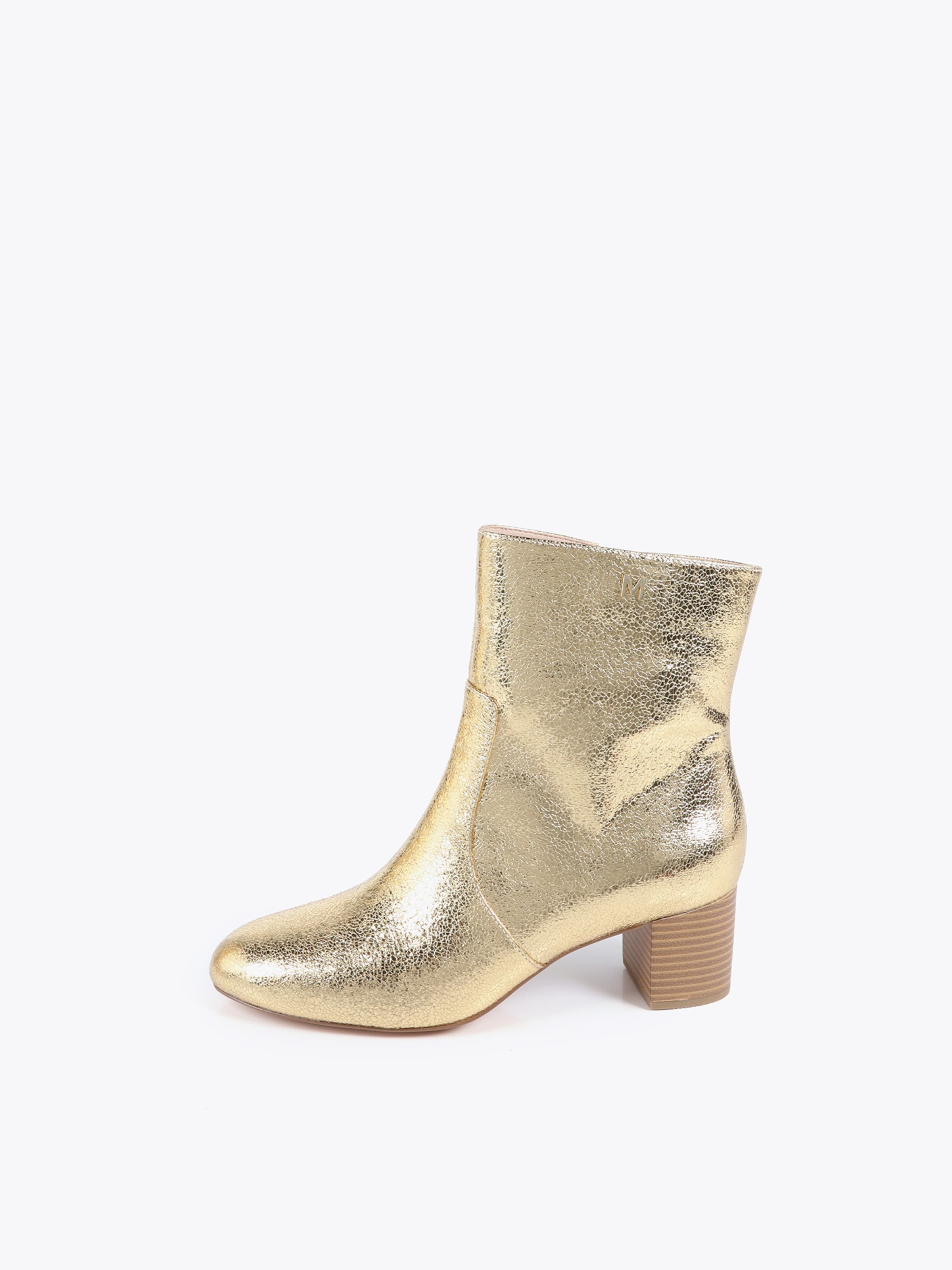 zelts Lola Casademunt Puszābaki: no priekšpuses