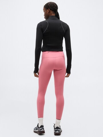 NIKESkinny Sportske hlače 'TEMPO' - roza boja