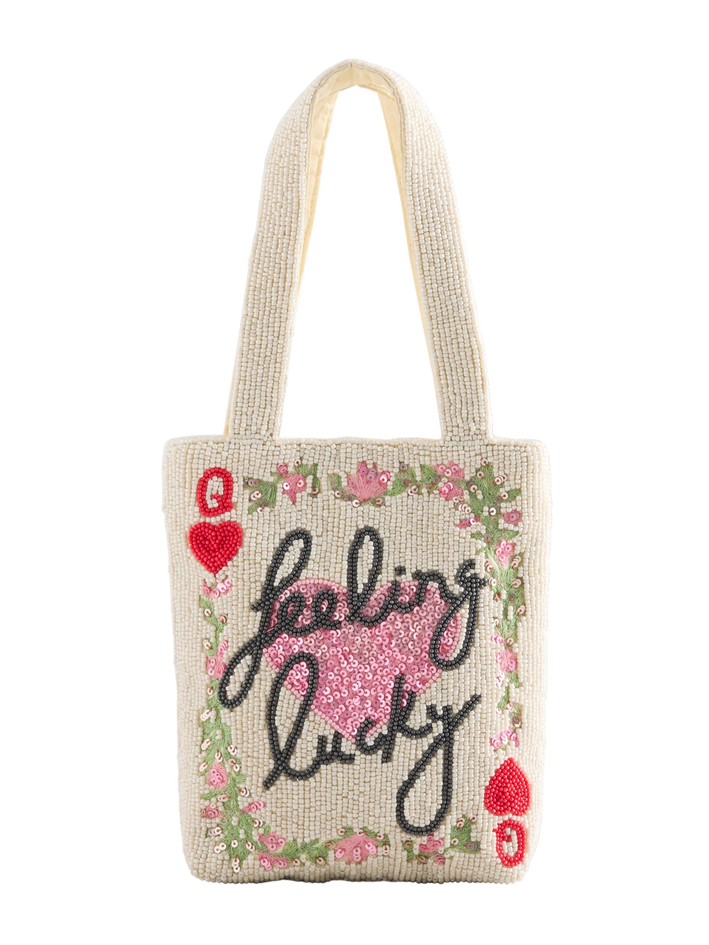 Next Ostoskassi värissä valkoinen: etupuoli