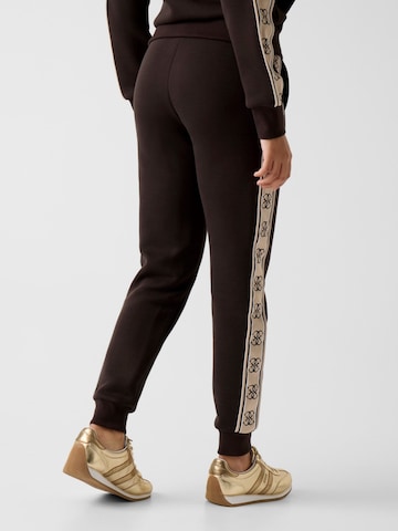 GUESS Regular Sportbroek 'V2YB15KB3P2' in Bruin