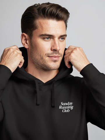 Neverless Sweatshirt 'Sunday Running Club' in Schwarz