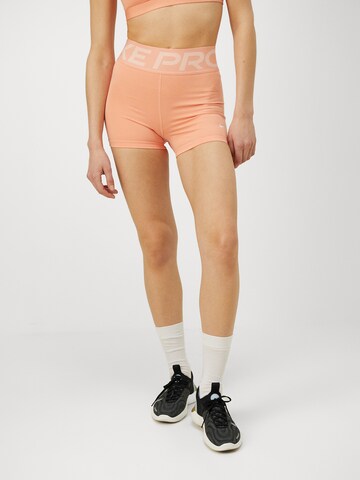 NIKE Skinny Sportshorts in Orange: Vorderseite