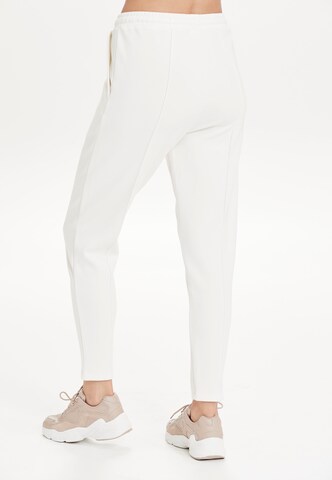 Athlecia Skinny Sportbroek 'Jacey' in Beige