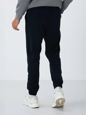 Tommy Life - Tapered Calças em preto