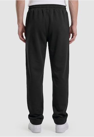 Urban Classics Loose fit Pants in Black: back
