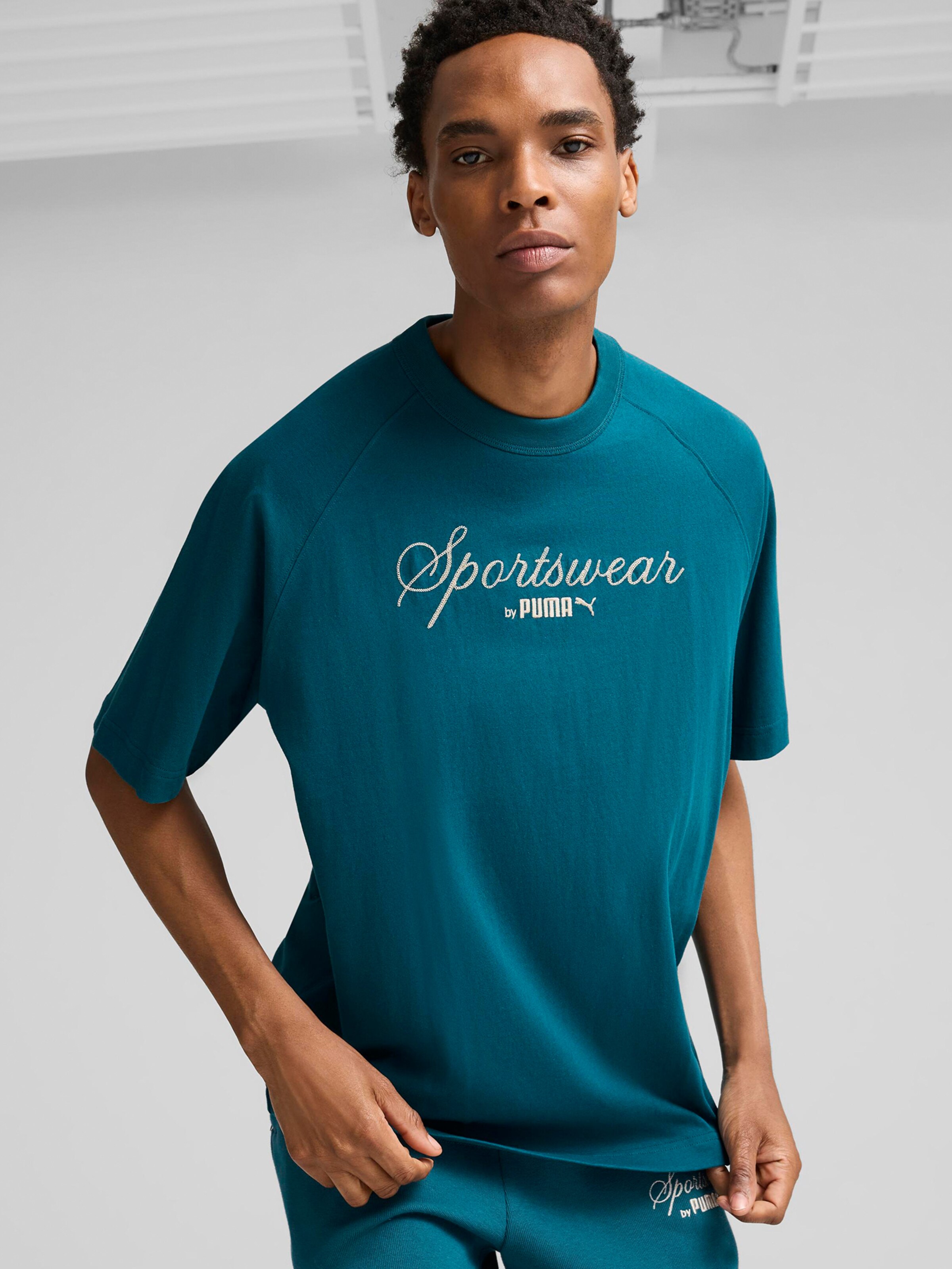 PUMA T Shirt Classics in Petrol ABOUT YOU