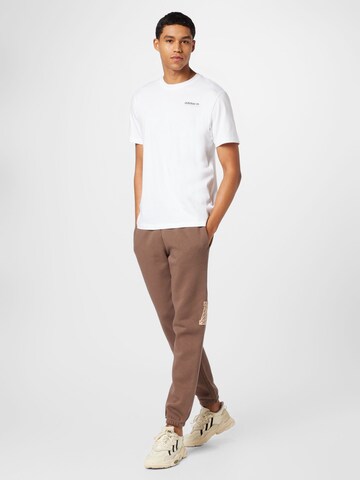 ADIDAS SPORTSWEAR Tapered Workout Pants 'All Szn X Logomania' in Brown