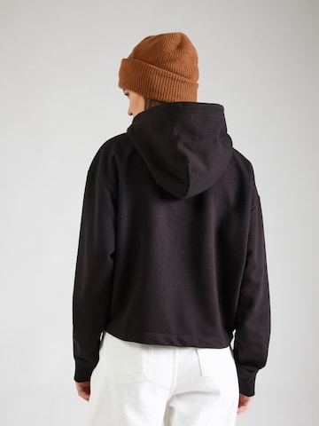 Tommy Jeans Sweatshirt 'ESSENTIAL' in Schwarz