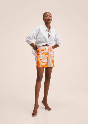 MANGO Normalny krój Spodnie 'Puc' w kolorze pomarańczowy
