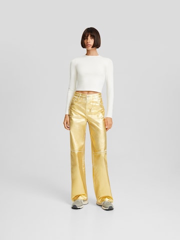 Bershka Szeroka nogawka Spodnie w kolorze złoty