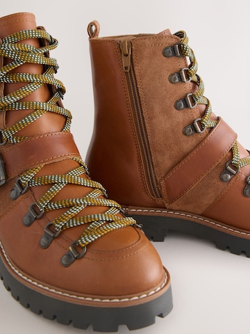 ruda Next Suvarstomieji kulkšnis dengiantys batai 'Forever Comfort'