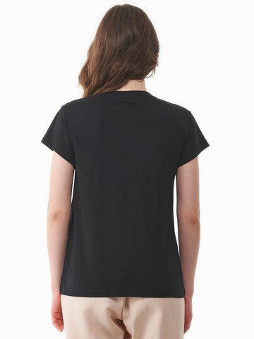 Organication T-Shirt in Schwarz