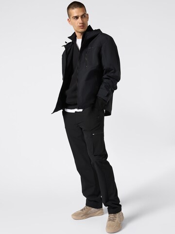 regular Pantaloni cargo di Champion Authentic Athletic Apparel in nero