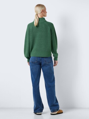 Noisy may Sweater in Green