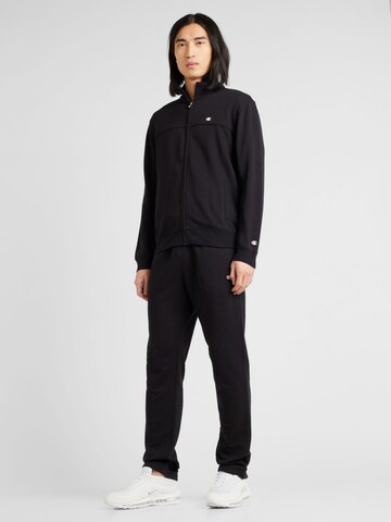 Champion Authentic Athletic Apparel Tracksuit in Black: front