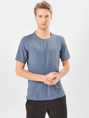 NIKE - Ajuste regular Camiseta funcional en azul: frente